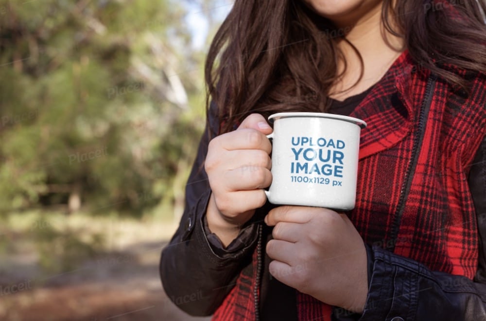 mockup of a woman holding an enamel mug