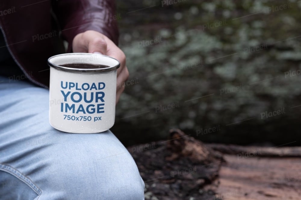 mockup of an enamel mug in hand