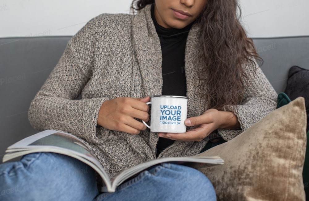 woman drinking from her 12 oz silver rim enamel mug