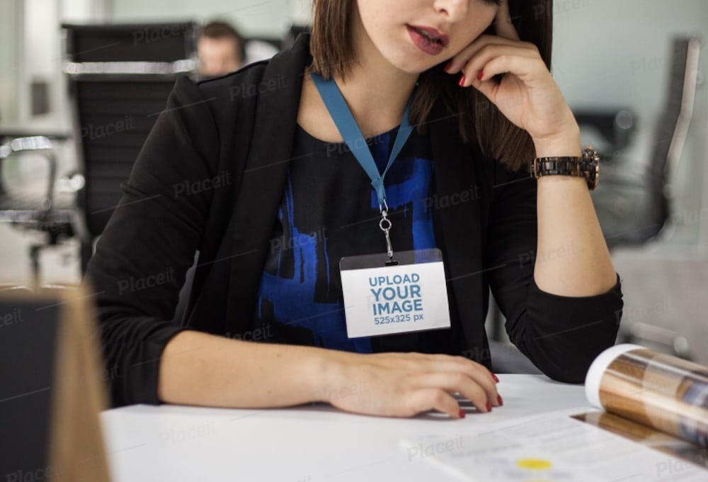 girl wearing a name tag while reading