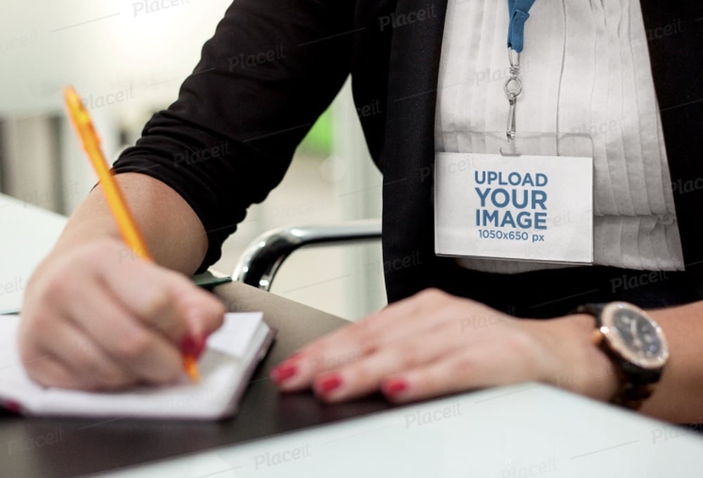 name tag mockup hanging from a girls neck