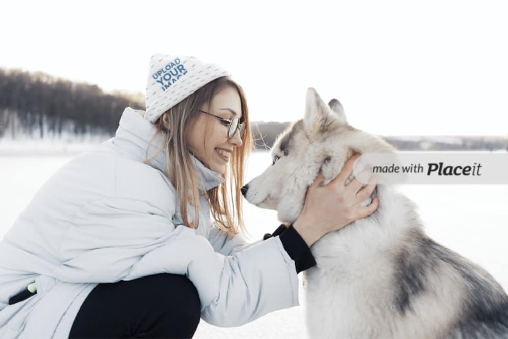 beanie mockup of a woman petting her dog