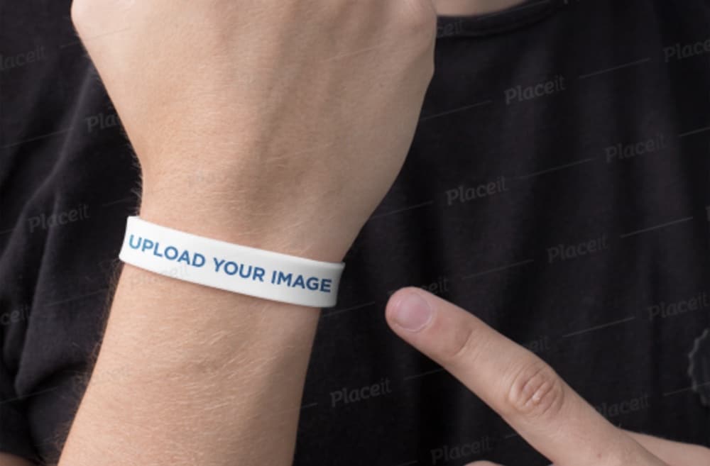 mockup of a man pointing at his wristband