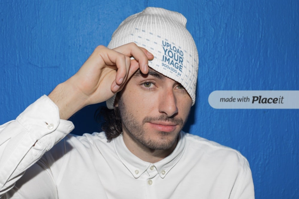 mockup of a playful man wearing a beanie