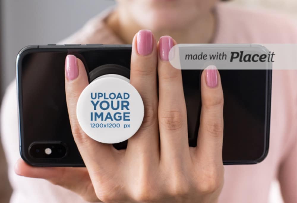 phone grip mockup of a woman holding her phone in landscape mode