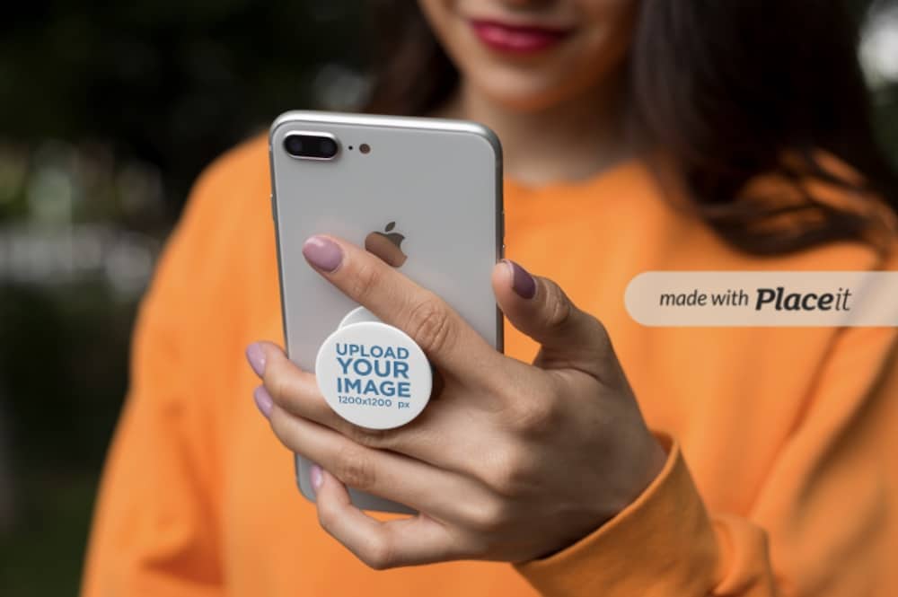 popsocket mockup of a woman checking her phone