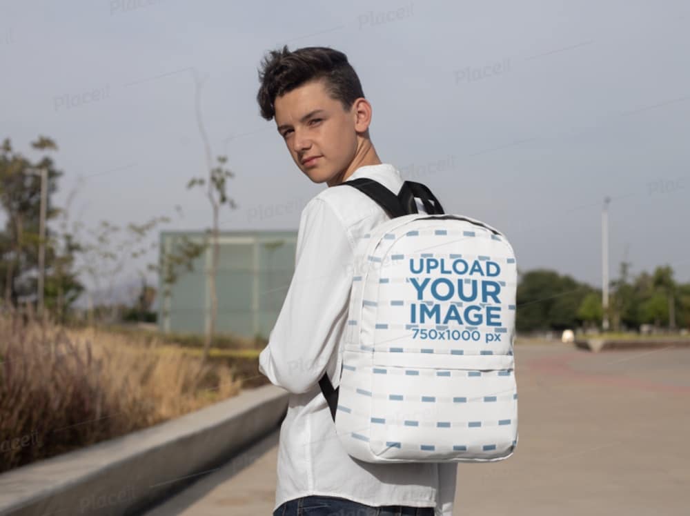 teenager wearing a backpack looking at the camera mockup